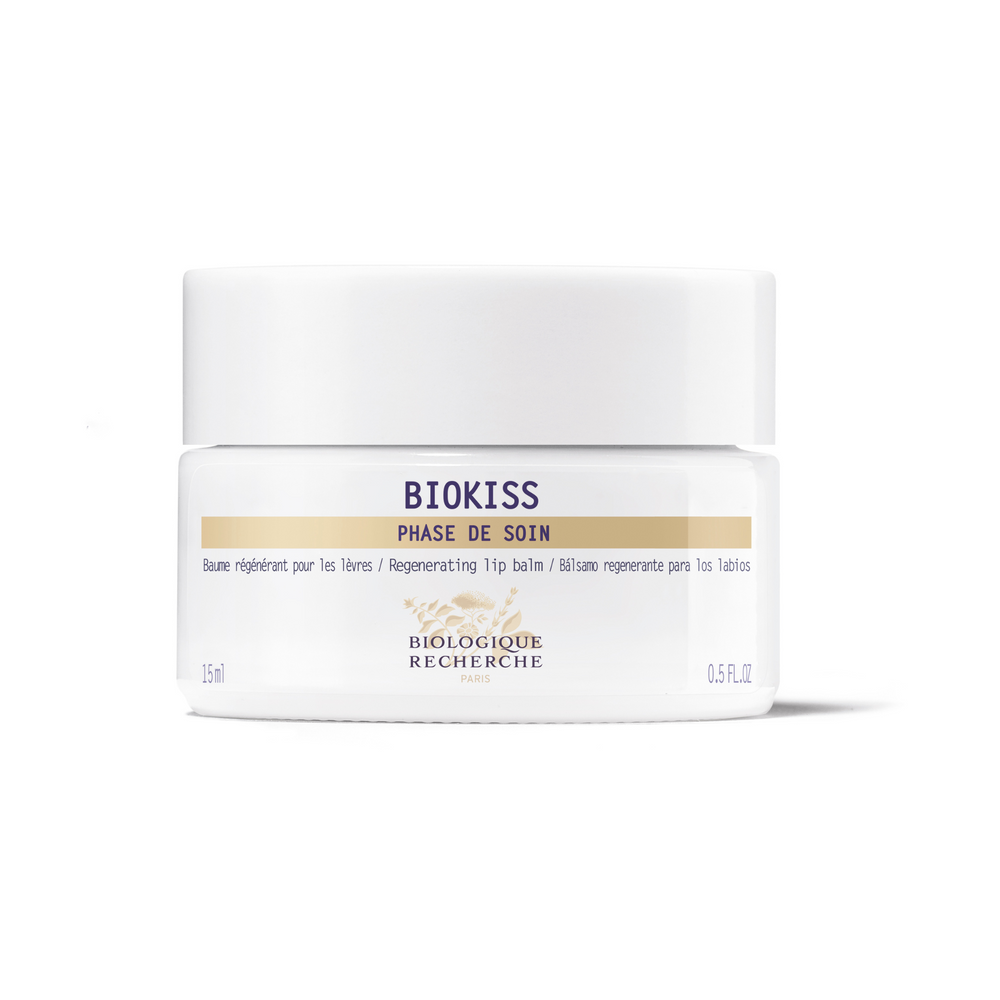 Biologique Recherche Biokiss lip balm in compact tub, designed to hydrate and repair chapped lips with box.