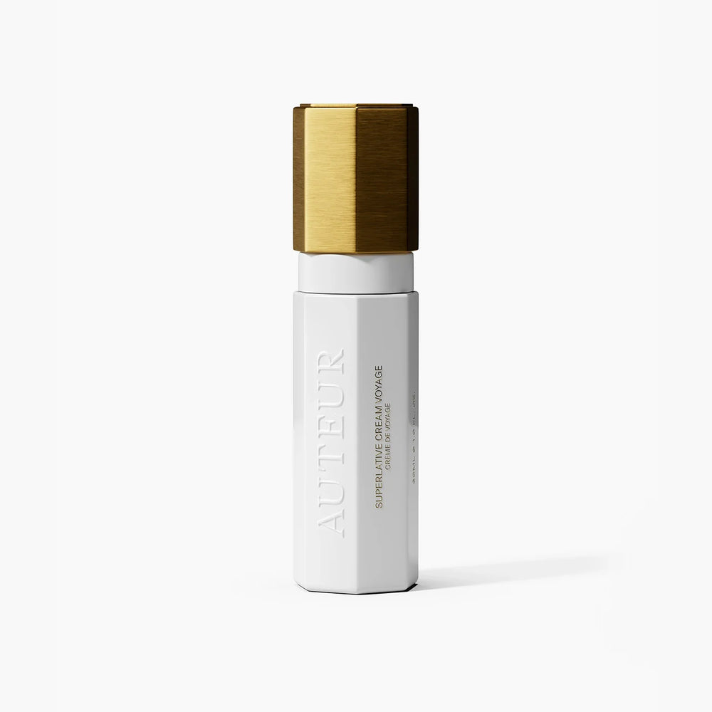 
                  
                    White skincare bottle with gold cap on a white background
                  
                